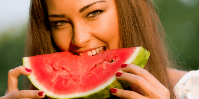 girl eating watermelon to lose weight